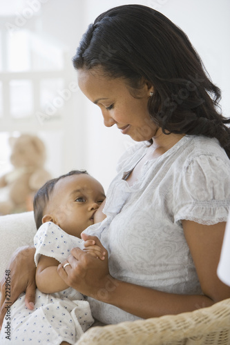 African American mother breastfeeding baby