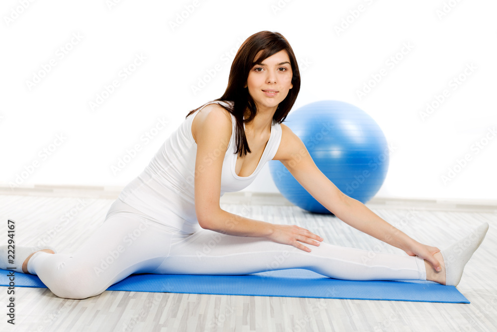 Obraz premium Woman doing fitness exercise