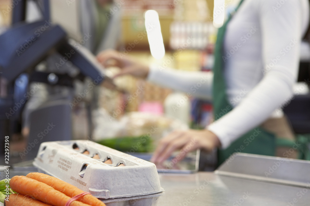 Groceries on check out counter Groceries on check out counter