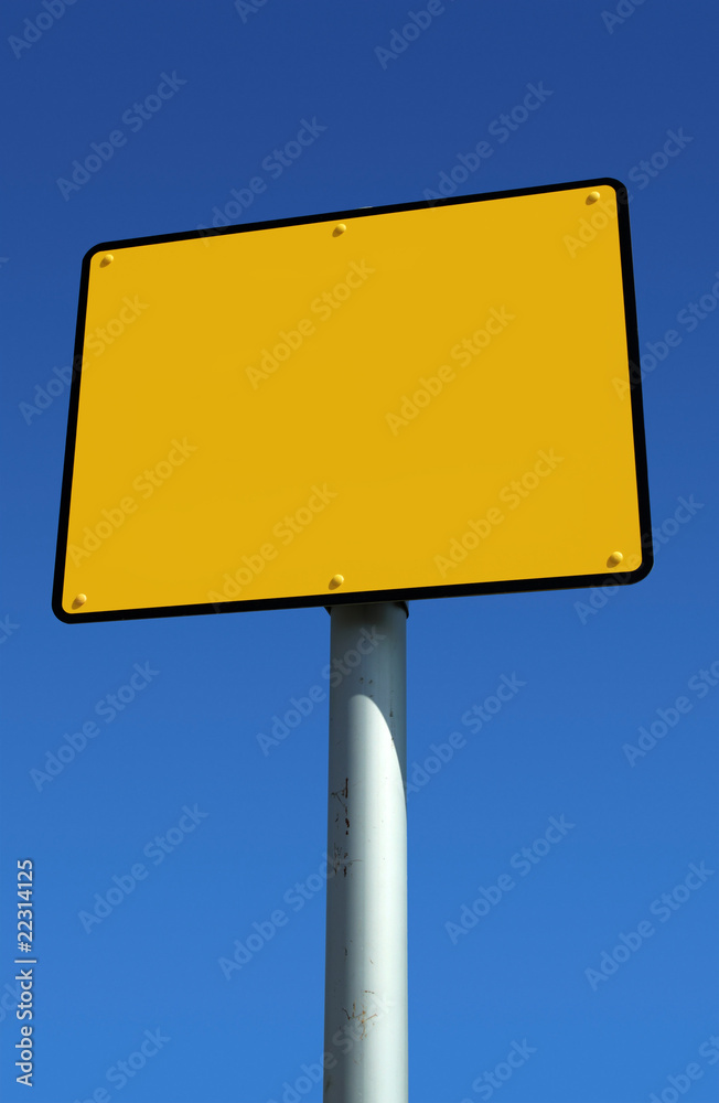 Blank yellow sign ready for text and blue sky. Blank yellow sign ready for text and blue sky.