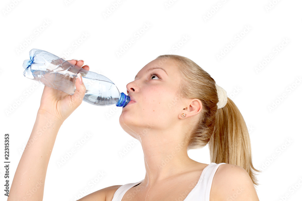 girl drinks water from bottle. concept of healthy way of life. girl drinks water from bottle. concept of healthy way of life.