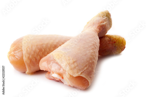 raw chicken legs isolated on white
