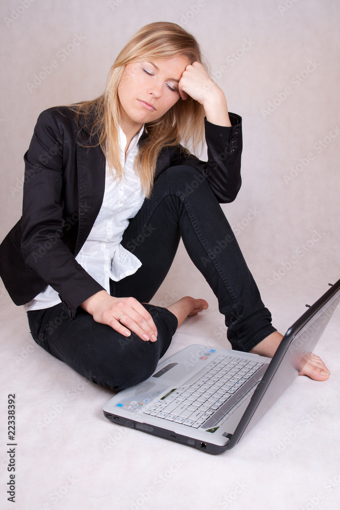 Beautiful business woman sleeping over laptop - obrazy, fototapety, plakaty 