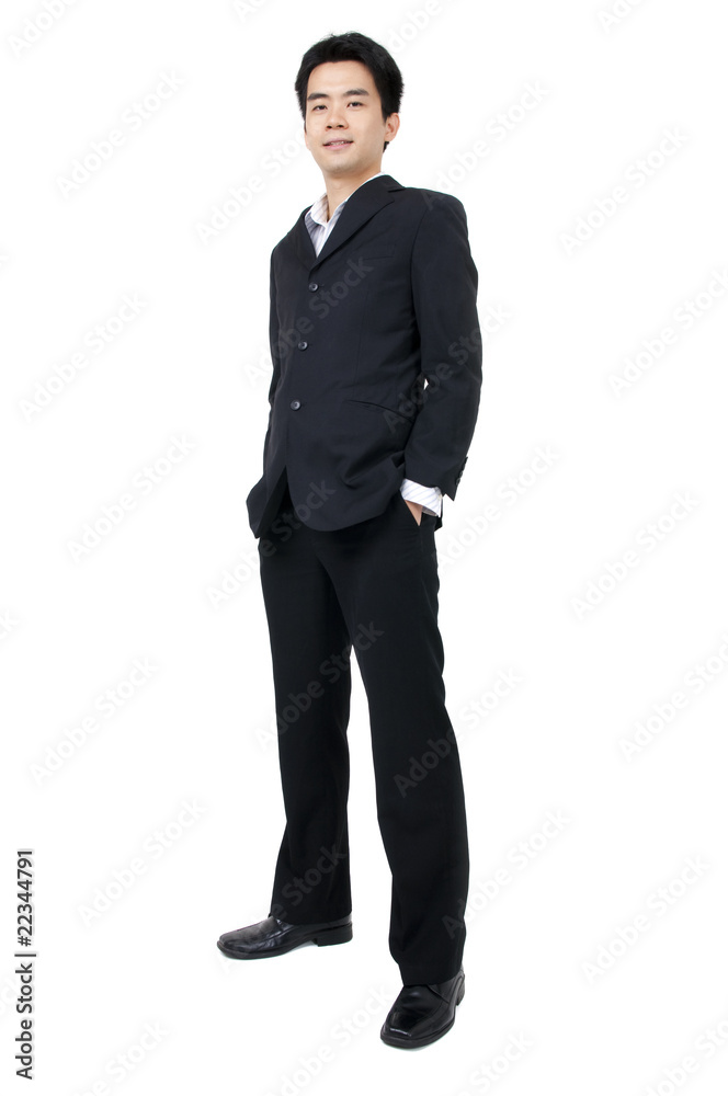 Full body of a smiling young Asian executive Full body of a smiling young Asian executive