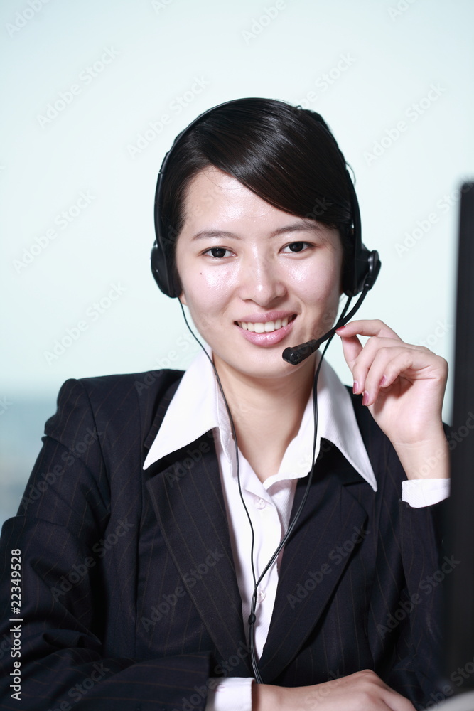 business woman working with headphone business woman working with headphone