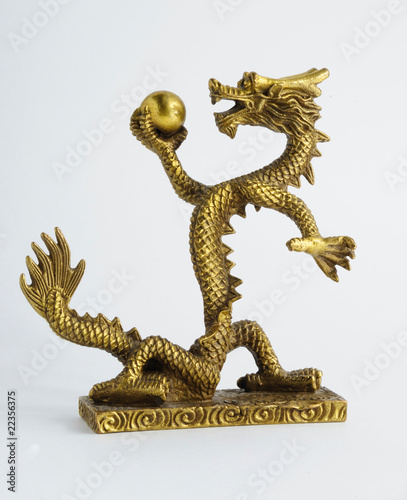 Golden Chinese Imperial Dragon with Pearl, isolated on white