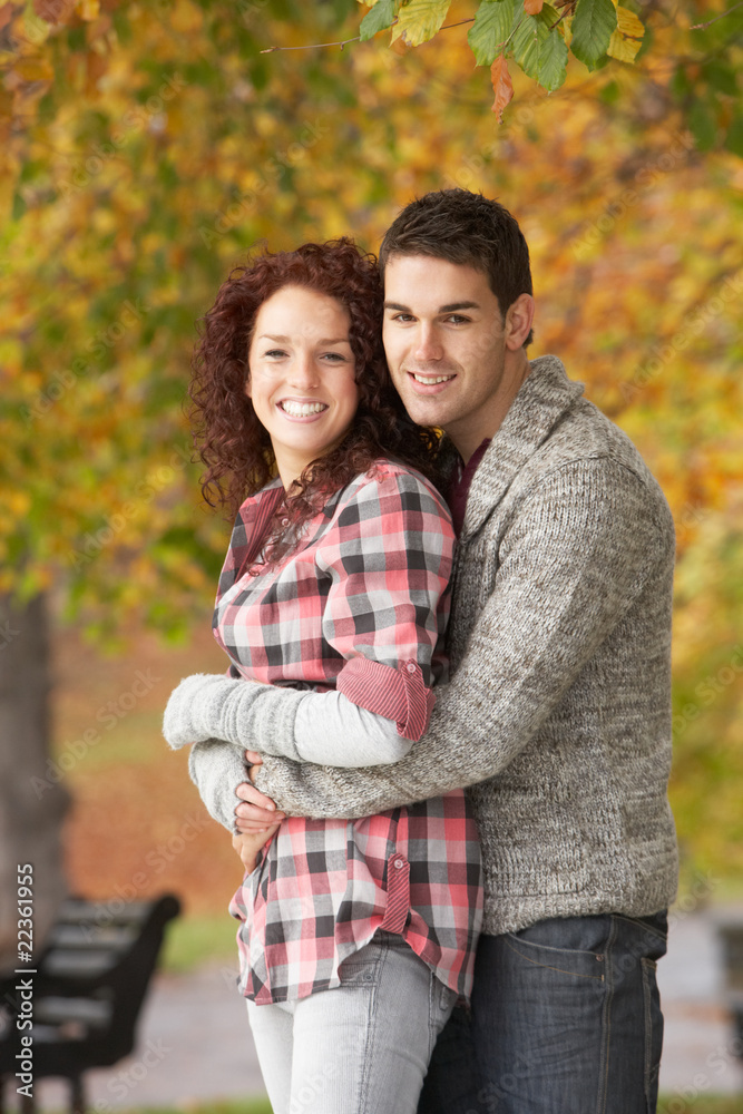 Romantic Teenage Couple In Autumn Park Romantic Teenage Couple In Autumn Park