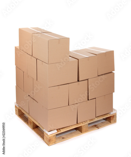 cardboard boxes on wooden palette