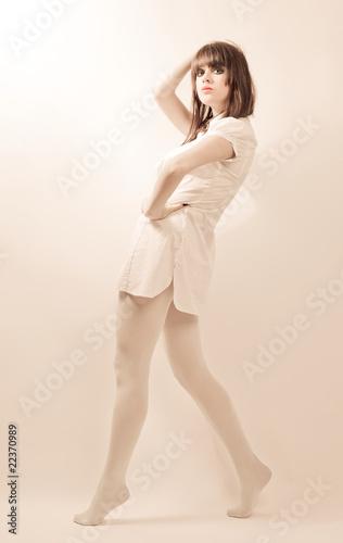 Young beautiful women in white pantyhose with stage make-up