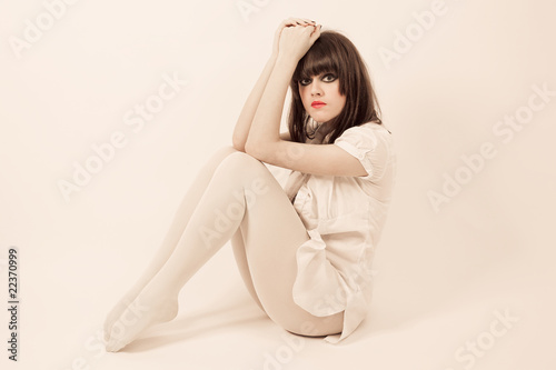 Young beautiful women in white pantyhose with stage make-up