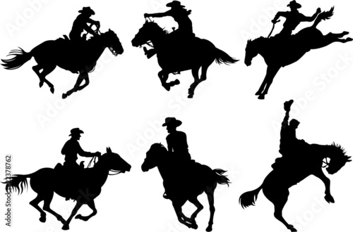 Obraz na plátne Cowboys silhouettes