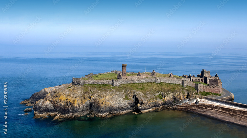 Ancient Castle on Island with Cliffs in the sea