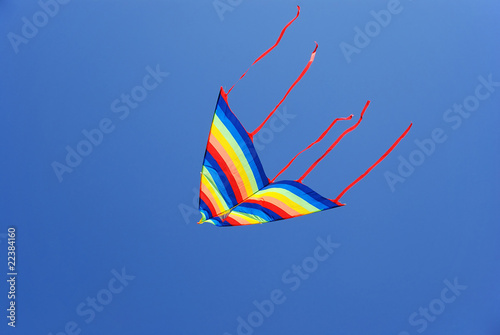 Kite against blue sky
