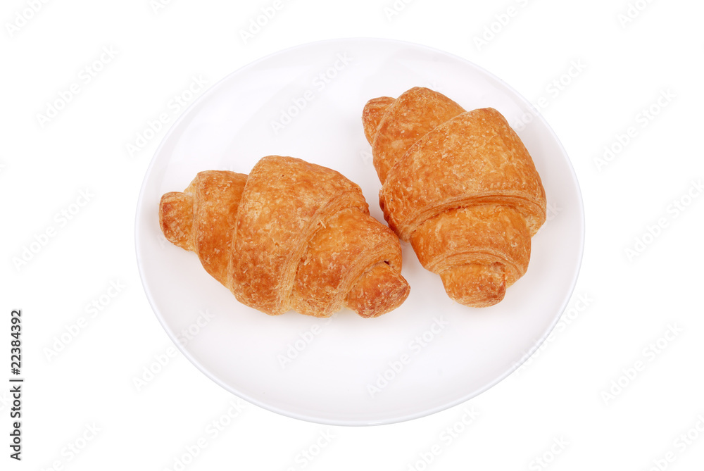 Fresh buns on a plate isolated