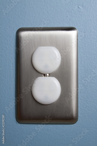 An North American electrical outlet with safety plugs