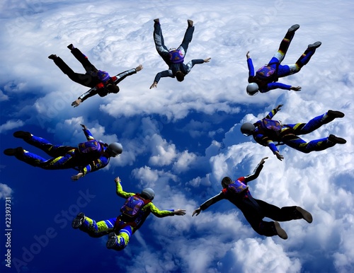 Sportsmen-parashutist soaring in sky