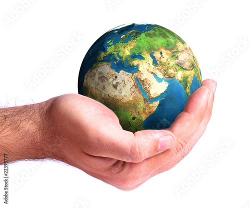 hand holding the globe