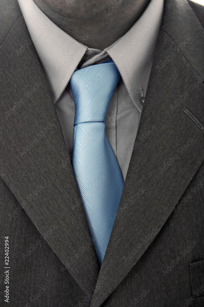detail of a Business man Suit with blue tie
