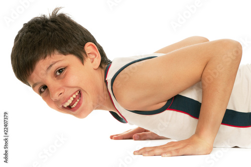 Sporty boy pushing up