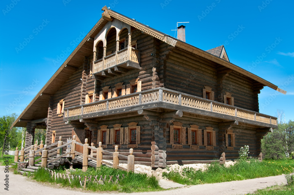 Wooden big house from timbers and windows on it. Wooden big house from timbers and windows on it.