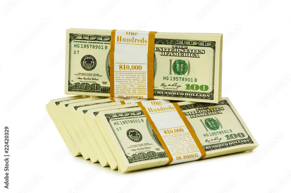 Stack of dollars isolated on the white Stack of dollars isolated on the white