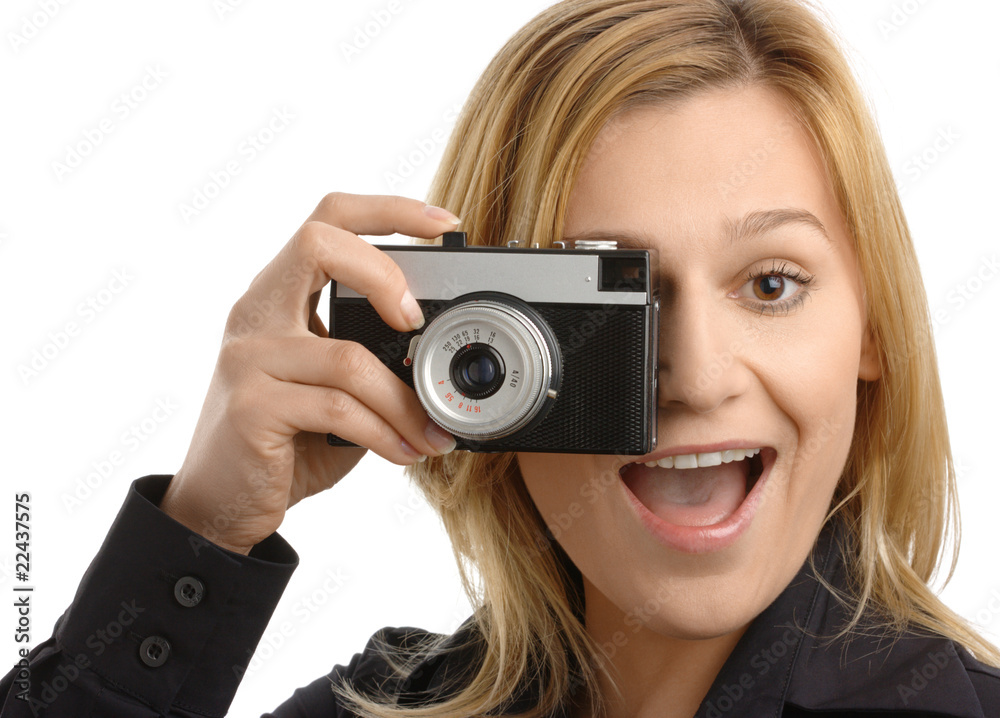 young woman taking a shot with photo camera young woman taking a shot with photo camera
