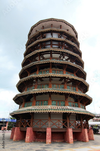 The leaning clock tower of Teluk Intan photo