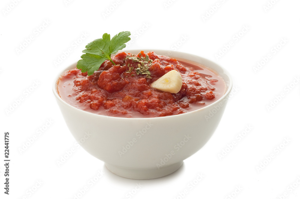 bowl with cooked tomato sauce with garlic, parsley and oregano bowl with cooked tomato sauce with garlic, parsley and oregano