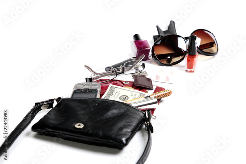 Woman Clutch Bag with some of its Contents