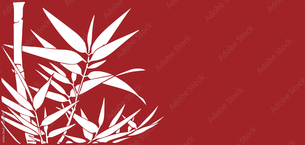 Bamboo leaves on a red background