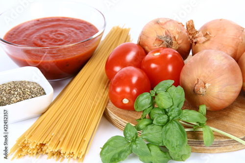 Ingredients for spaghetti bolognese or napoli on white