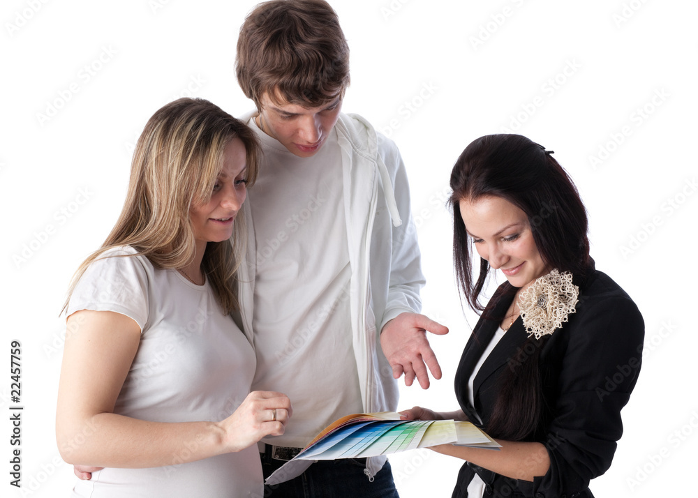 Pregnant family and designer of interior Pregnant family and designer of interior