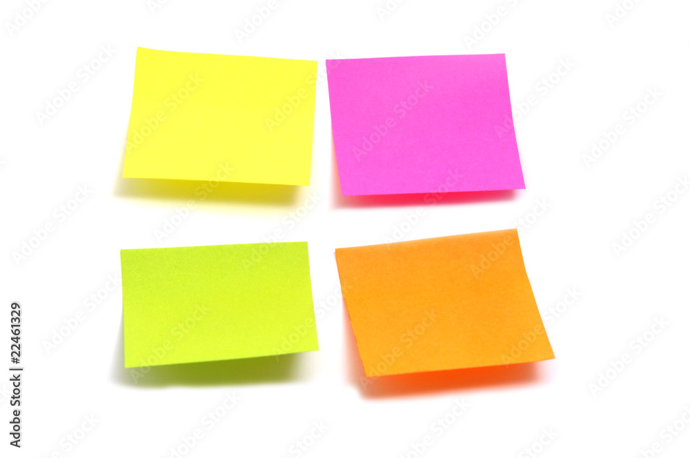 post it in different colors on a white background post it in different colors on a white background