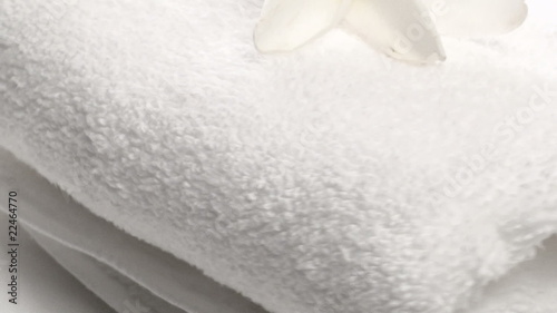 Spa towel and frangipani flower zoom out - HD