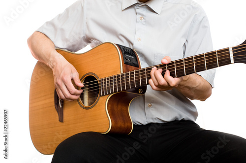 man plays guitar