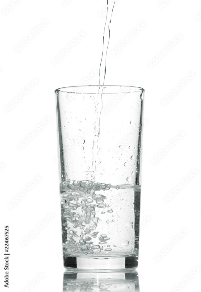 Water in a glass isolated on white background Water in a glass isolated on white background
