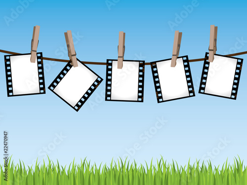 Film strips hanging on a line