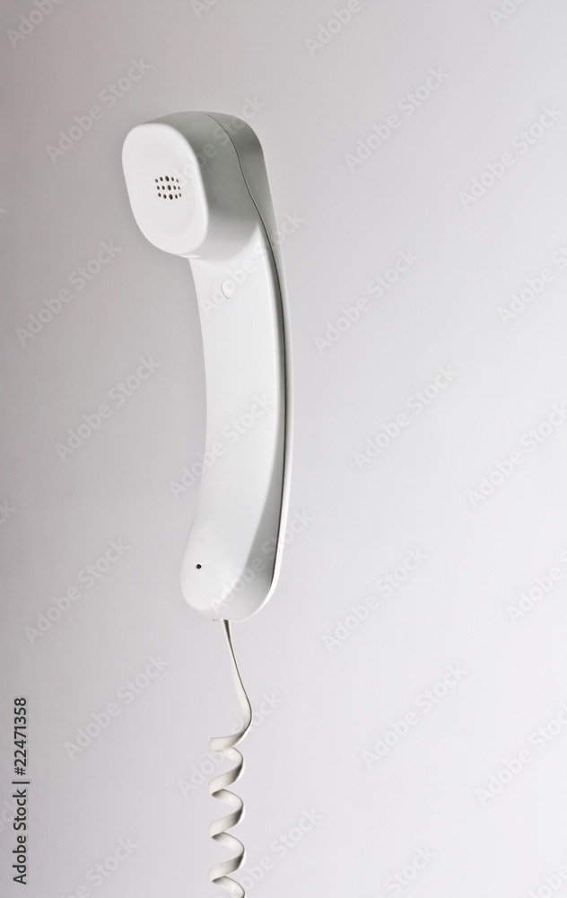 telephone receiver on cord. telephone receiver on cord.