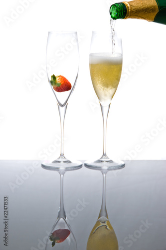 Pouring sparkling wine into glass