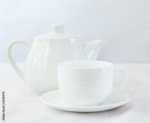 White tea pot and cup