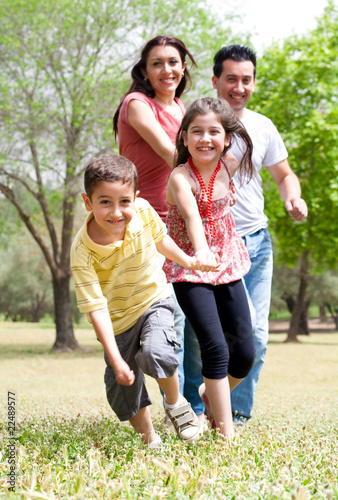 Happy family having fun in the park
