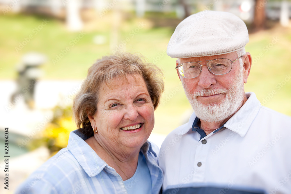 Happy Senior Couple in The Park Happy Senior Couple in The Park