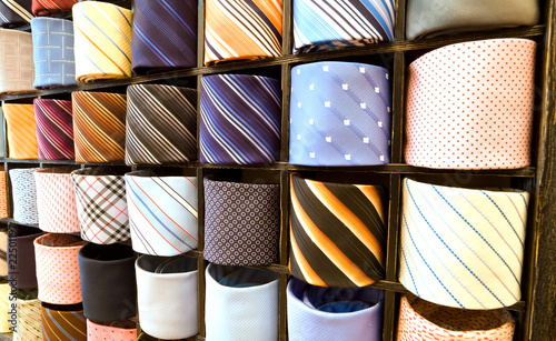 elegant italian neckties in a tie rack