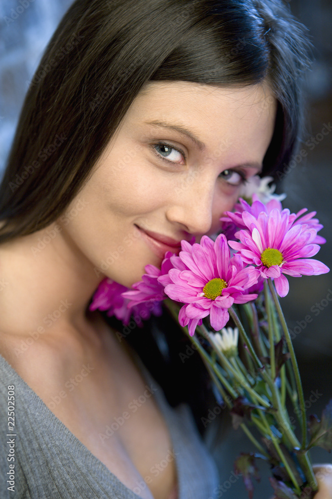 Young woman with flowers Young woman with flowers
