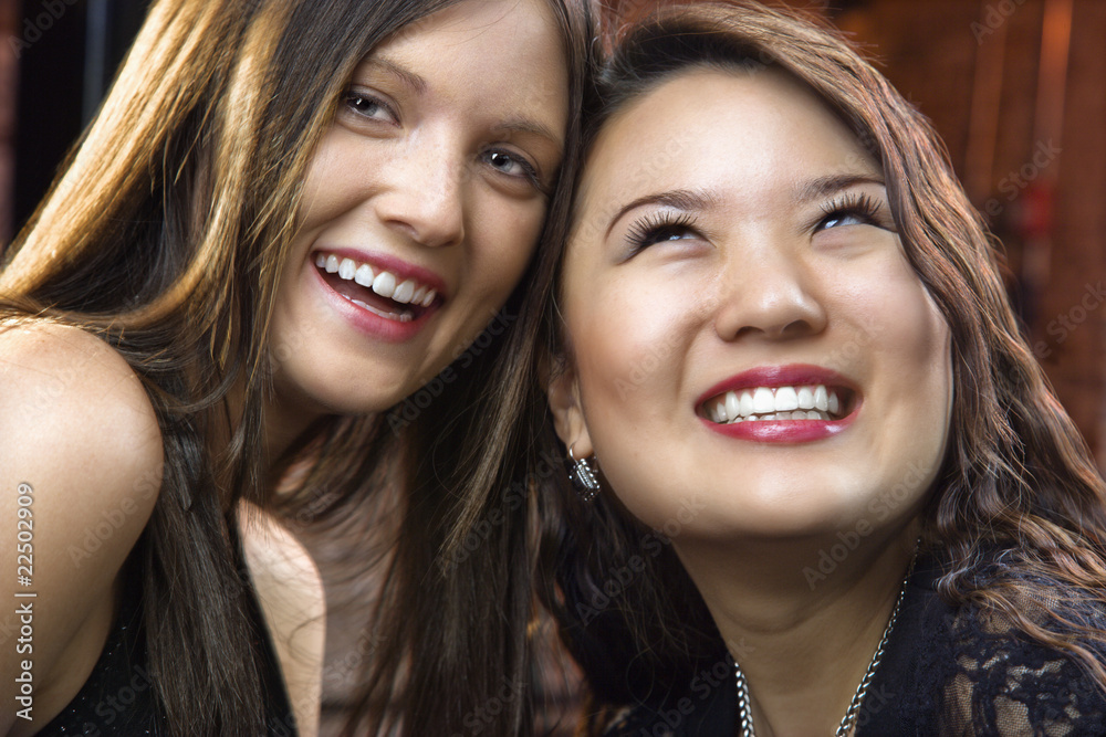 Fototapeta premium Pretty smiling young women
