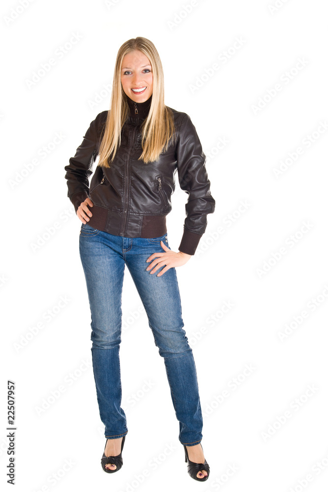 Woman in leather jacket and jeans isolated