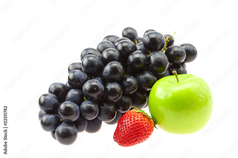 grapes, strawberries and apple isolated on white