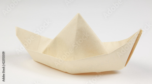 Paper boat on white