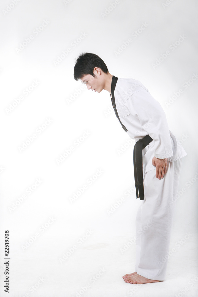 asian man playing with taekwondo