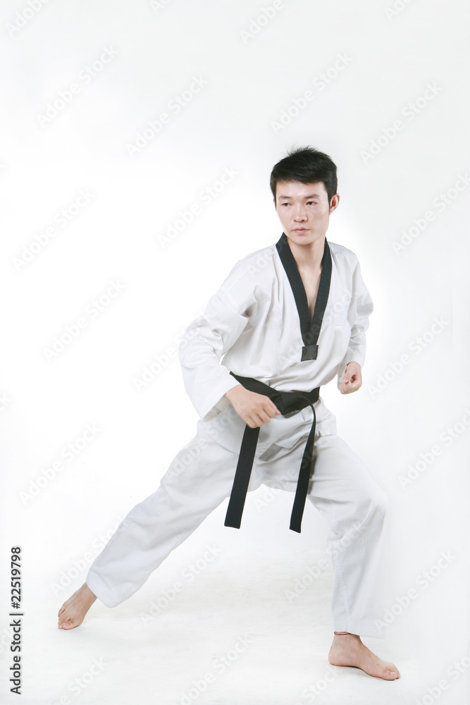 asian man playing with taekwondo asian man playing with taekwondo